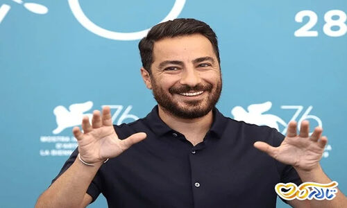عکس لباس متفاوت نوید محمدزاده با یک پرچم خاص